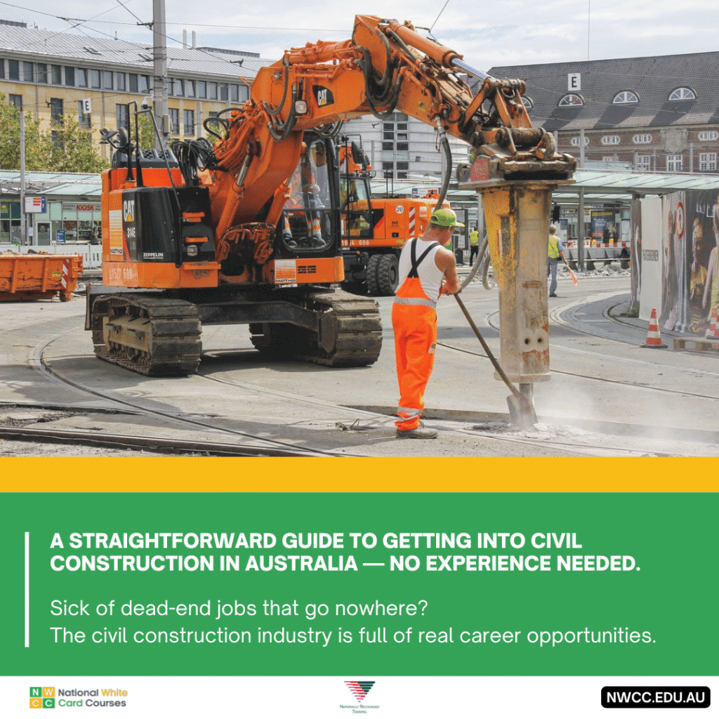 Worker operating jackhammer on urban street with excavator.