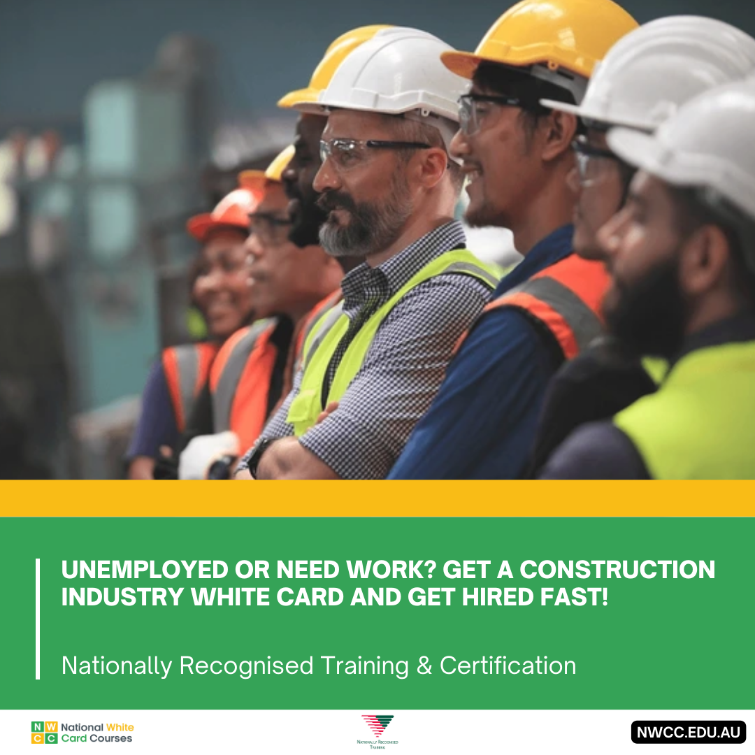 Construction workers lined up wearing helmets and high-vis vests