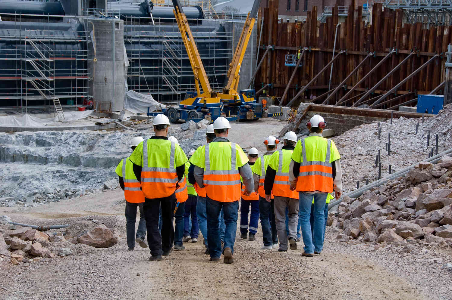 Construction workers in Australia at a construction site.